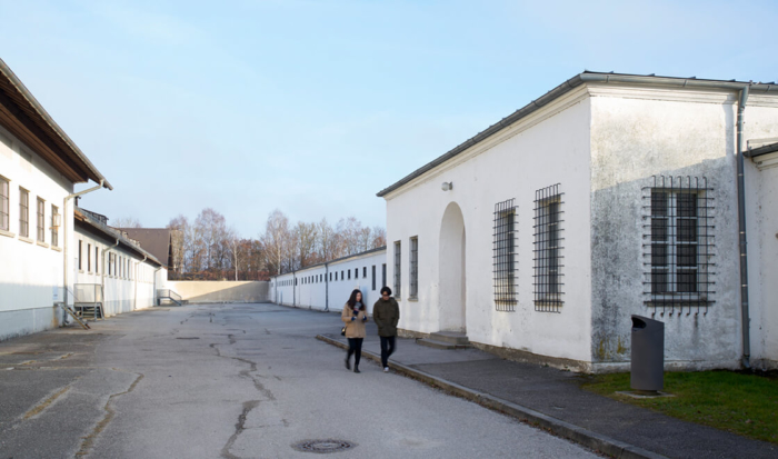 Parallel behind the former maintenance building is the onetime “bunker courtyard” and the “bunker”. The former “bunker” is a simple building; its entrance forks into two long wings. The onetime “bunker courtyard” lies between the former maintenance building and the “bunker”.