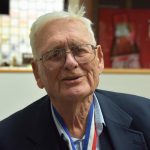 Portrait von Dan Dougherty, der in die Kamera lächelt